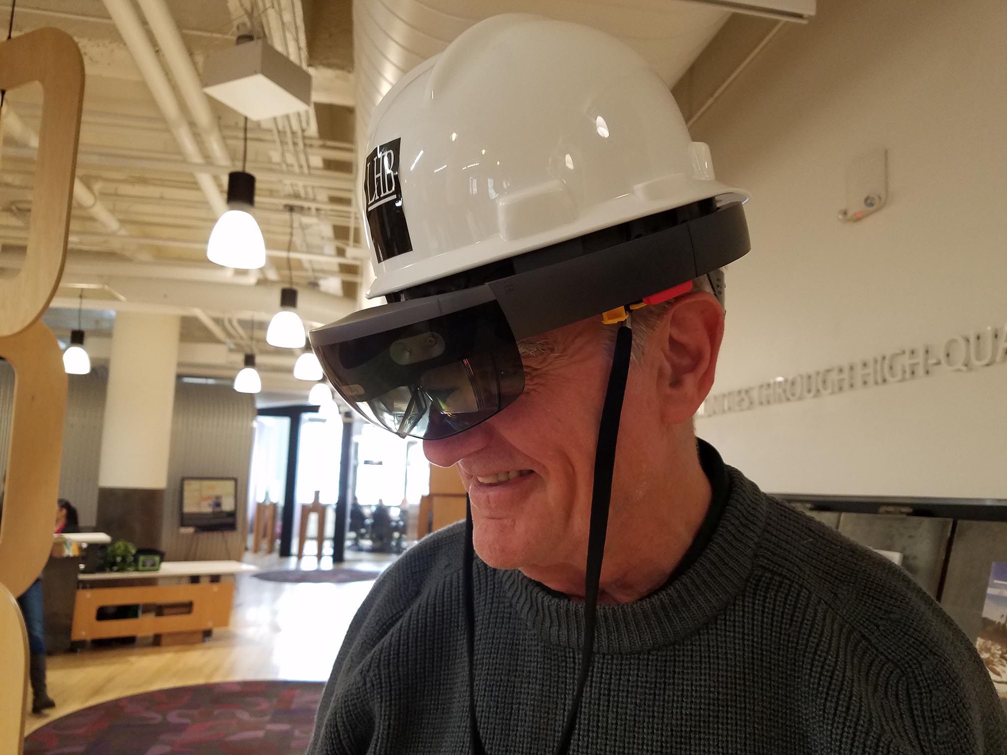 LHB Construction Administrator Roger Purdy using the Microsoft Hololens with Trimble hardhat for Hololens Image courtesy LHB Corp. https://www.lhbcorp.com
